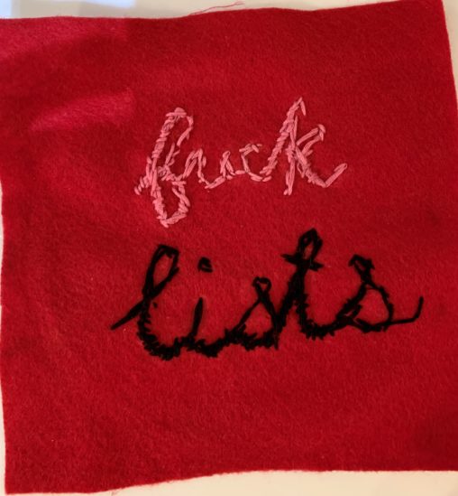 Fuck Lists - embroidered on red fabric