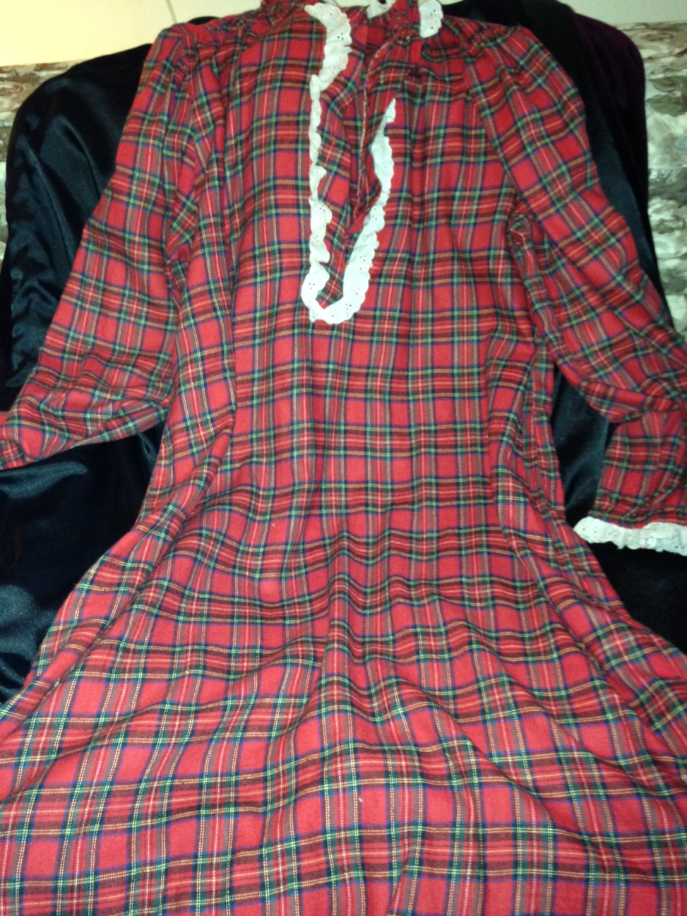 Red plaid nightgown with white piping down the front.