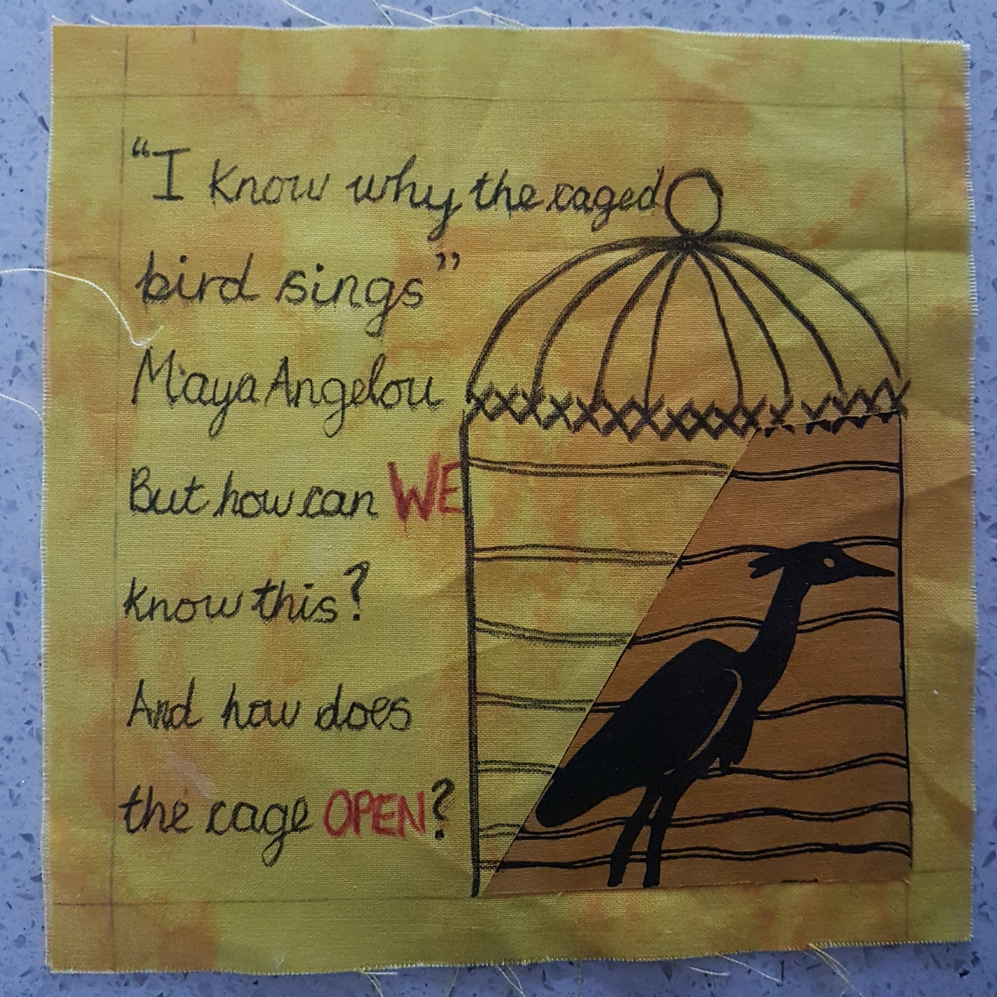 why does a caged bird sing poem