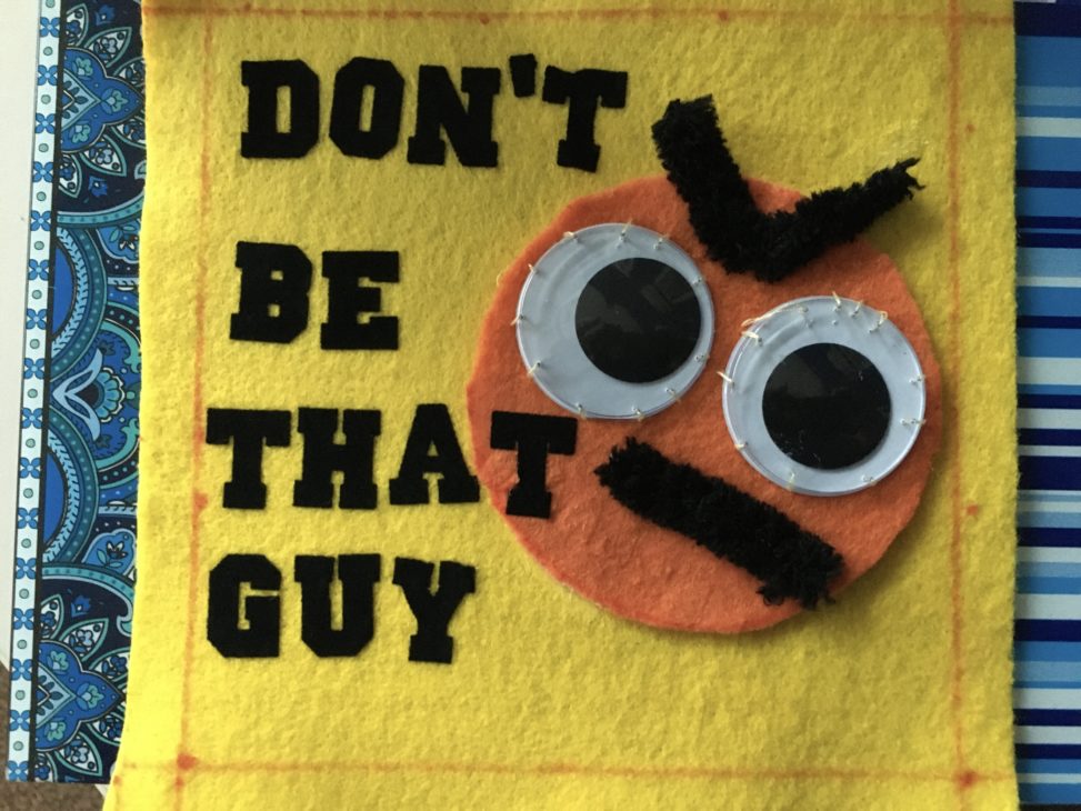 quilt square with text saying don't be that guy
