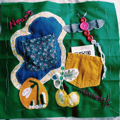 Quilt square with applique Ireland, snowdrop, mayfly and pockets.